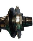 A close-up of a bicycle hub component with black and dark metallic parts.
