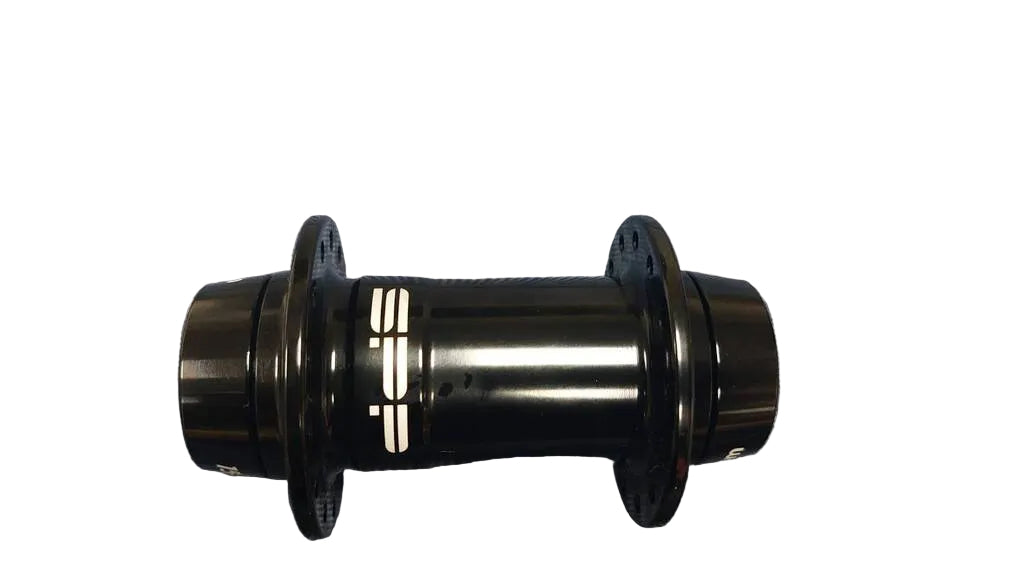 A black bicycle hub with white lettering on the center section..