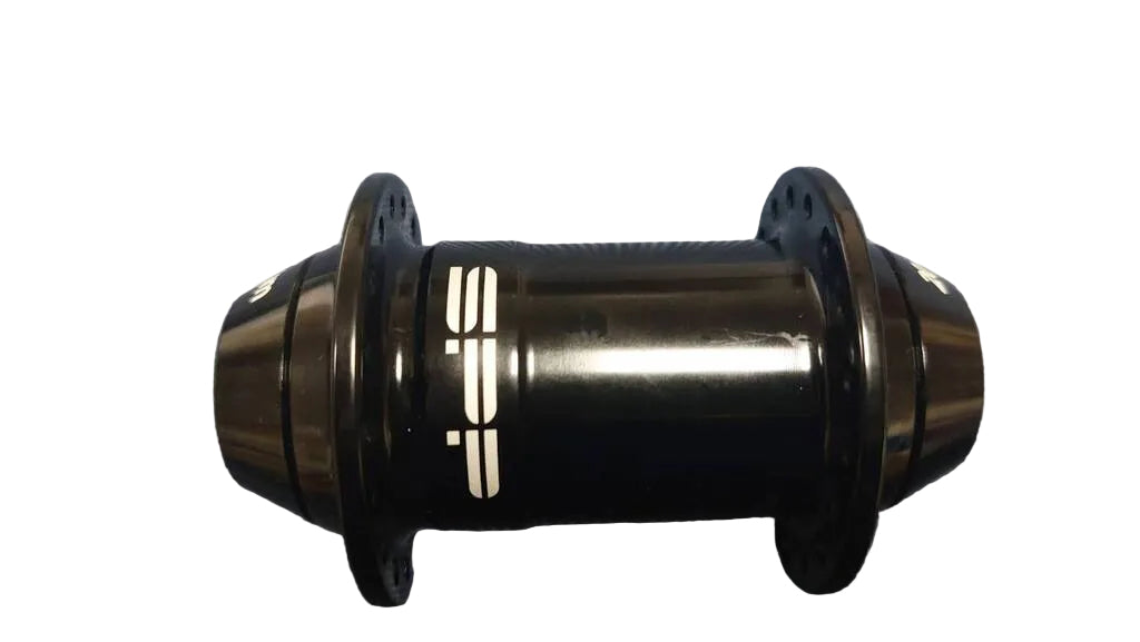 A black bicycle hub with white lettering on the center.