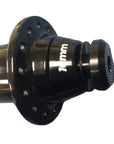 A close-up of a black bicycle hub with '10mm' printed in white on its side.
