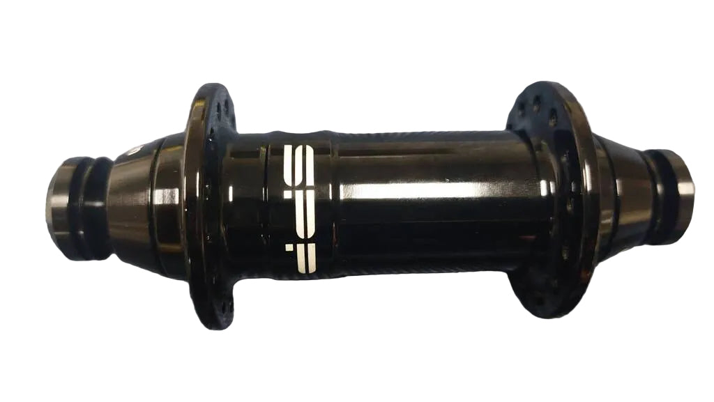 A black bicycle hub with white branding.
