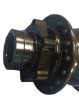 A close-up of a bicycle hub component with a black outer flange and metallic silver and bronze-toned inner parts..