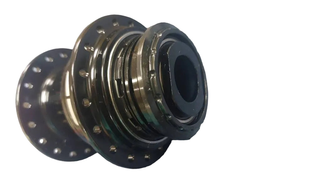A close-up of a metallic bicycle hub component with dark steel and black finish.