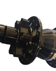 A black bicycle hub with a metallic finish, featuring a small red and white stripe on its side.