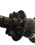 A black bicycle hub with a metallic finish, featuring a small red and white stripe on its side.