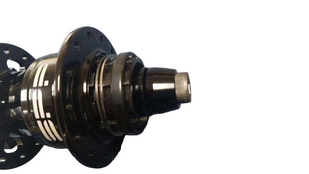 A close-up of a bicycle hub component .